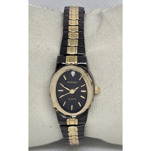 Woman\'s Embassy Elegant Petite Oval Black Gold Two Tone Expansion Watch 10
